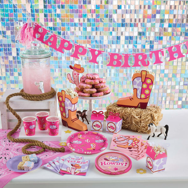 Boots and Bows party supplies on a table