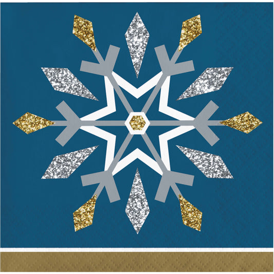 Decorative snowflake paper napkin with gold, silver, and white on a blue background
