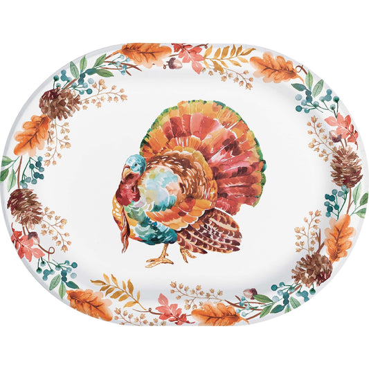 Tasteful Turkey Oval Dinner Paper Plates 96 ct. Decorative plate with a turkey design and autumn leaves on a white background