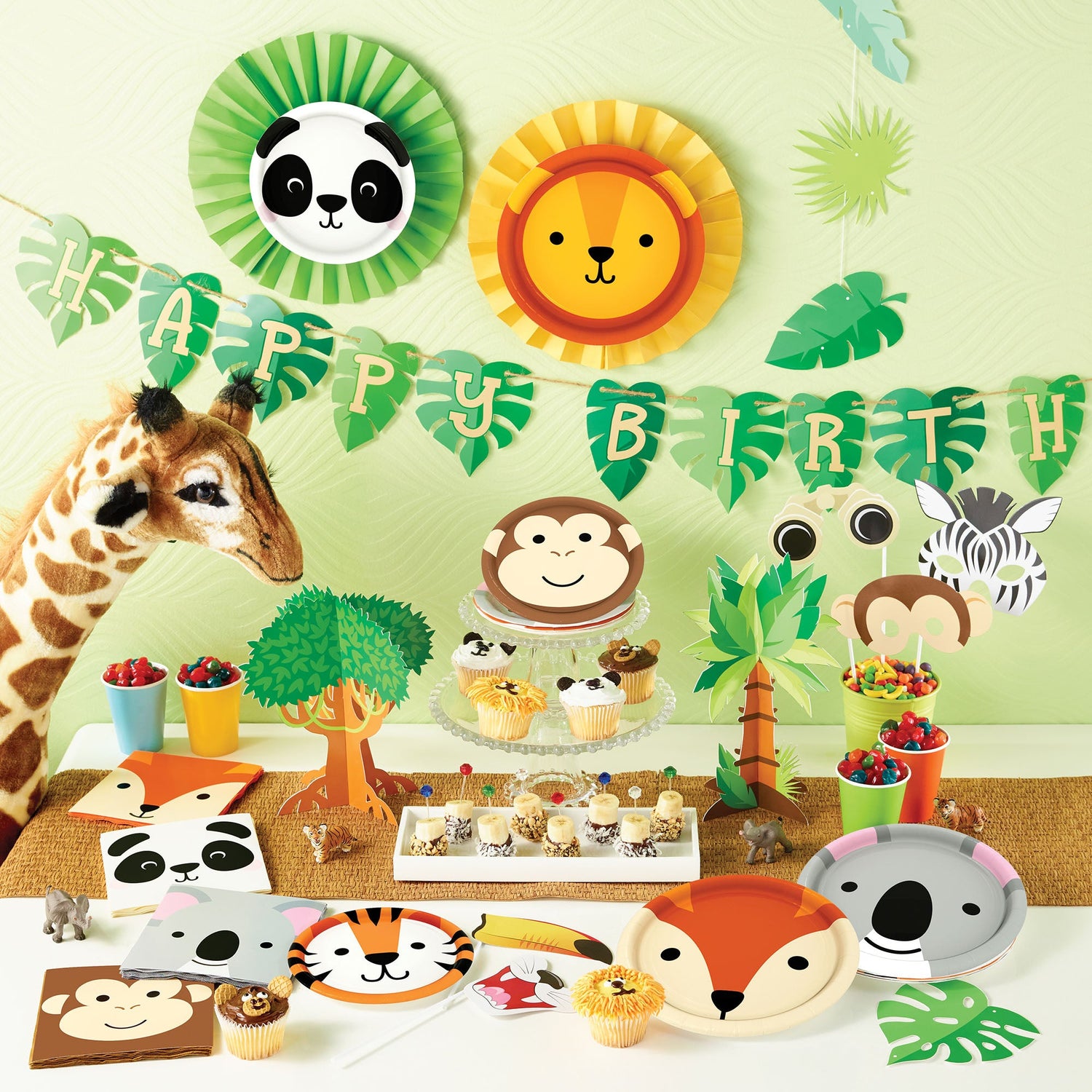 Animal Faces Party Supplies displayed on a table