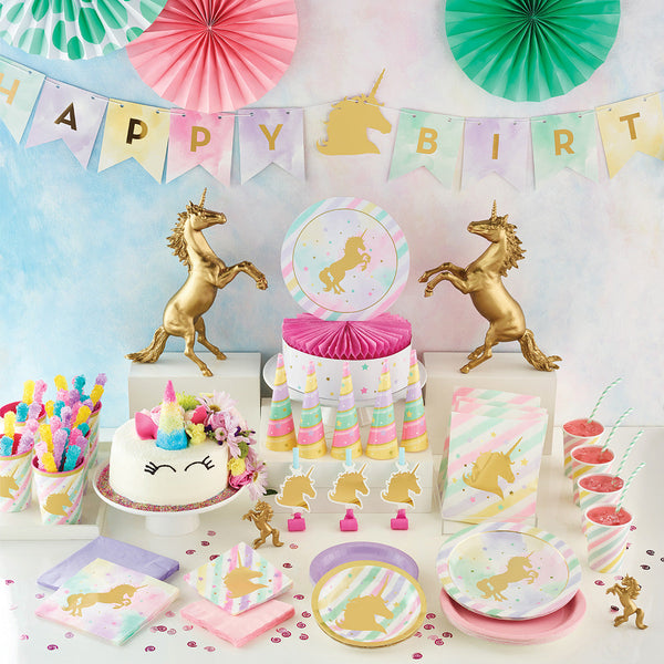 Sparkle Unicorn Party Supplies displayed on a table