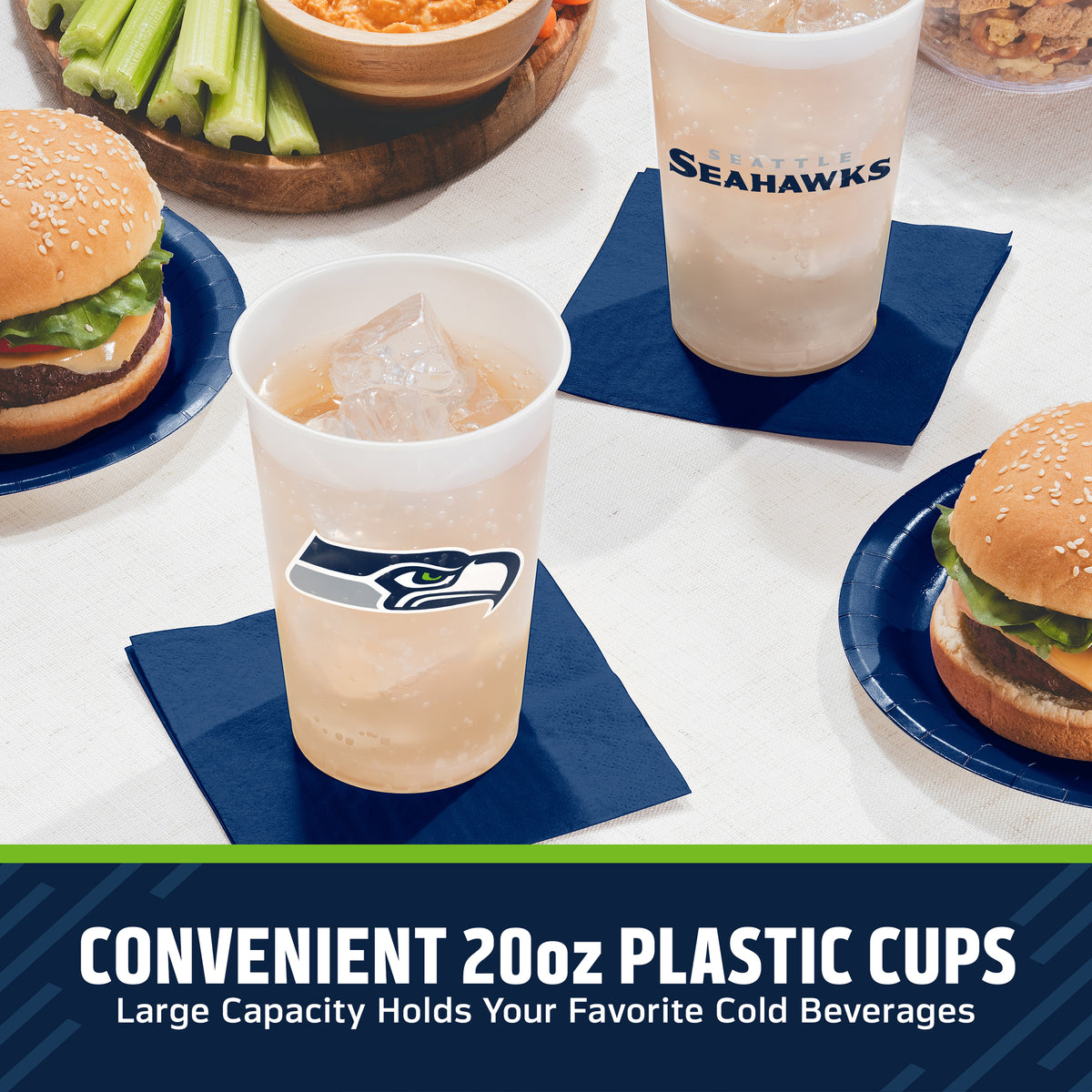 Two Seattle Seahawks themed 20oz plastic cups on navy blue napkins, shown with burgers and celery on a table. A text banner at the bottom reads 'CONVENIENT 20oz PLASTIC CUPS Large Capacity Holds Your Favorite Cold Beverages'.