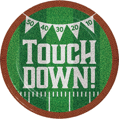 Tailgate Time Touch Down Dinner Paper Plates 96 ct. Football paper plate with "Touch Down!" written on it on a grass background with brown rim