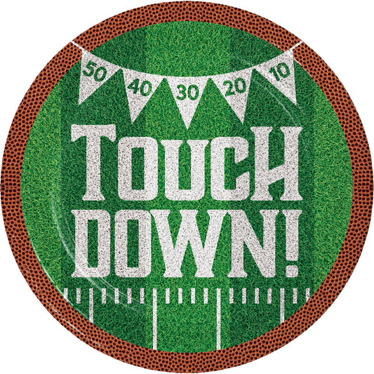 Tailgate Time Touch Down Dinner Paper Plates 96 ct. Football paper plate with "Touch Down!" written on it on a grass background with brown rim
