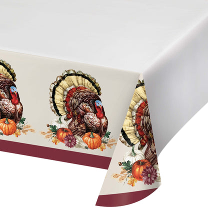 Vintage Turkey Paper Tablecloths 12 ct. Tablecloth with turkey and pumpkin design on a white background