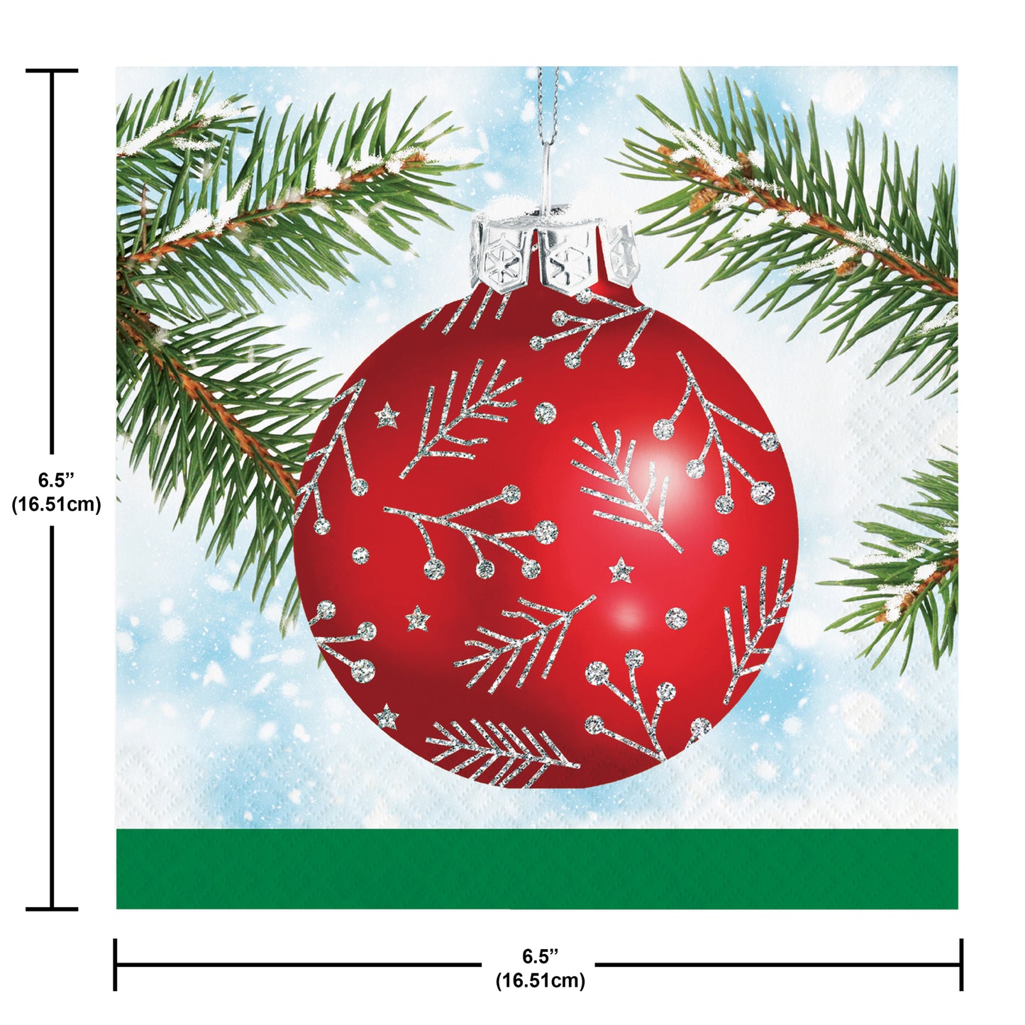 Paper napkin with a red Christmas ornament with silver designs on a branch with snow. Measurements shown.