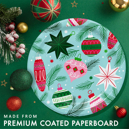 Holiday Frills Dinner Paper Plates 96 ct. Decorative paper plate with Christmas ornaments on a green background with festive decorations.