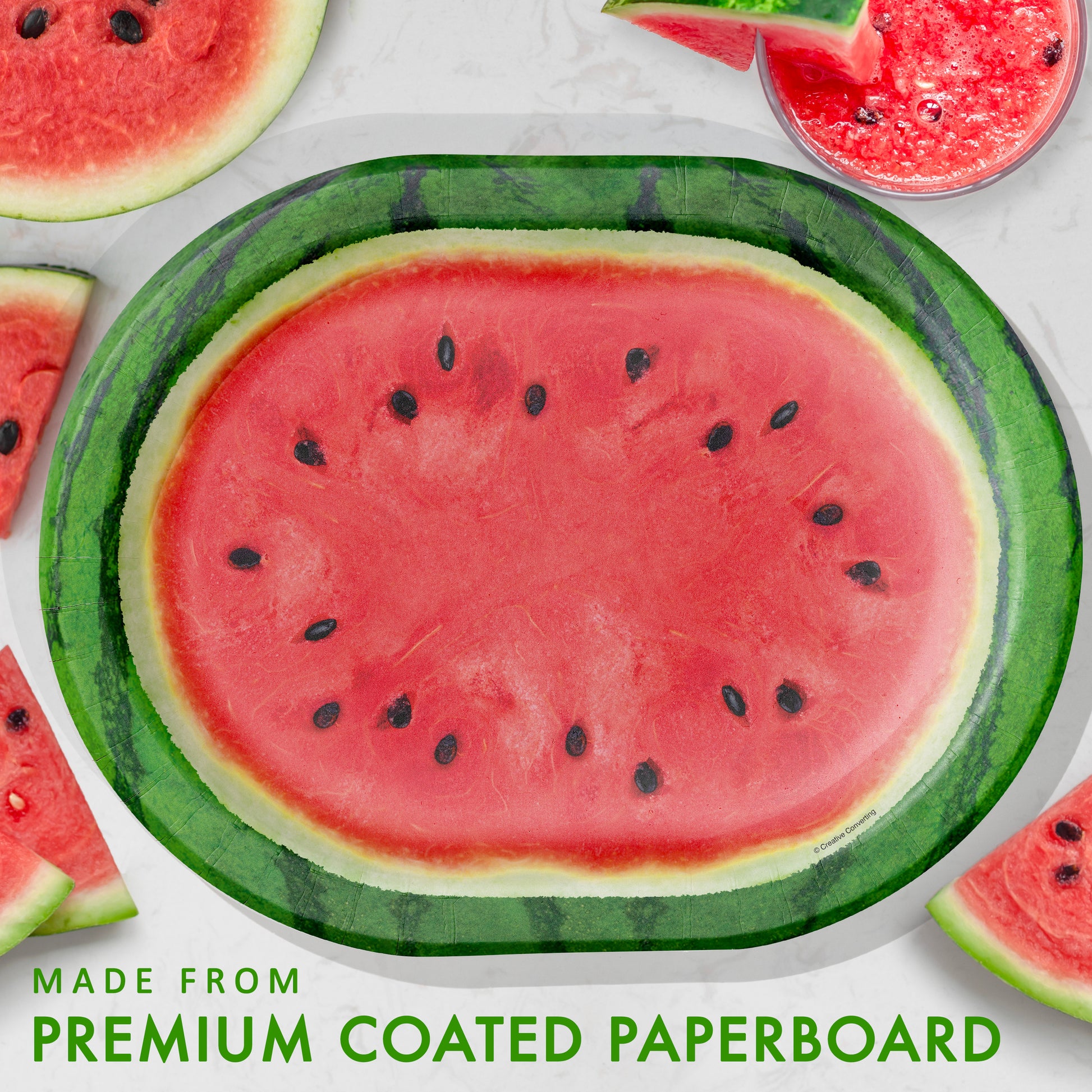 Sliced watermelon oval plate on a white background with text 'Made from Premium Coated Paperboard'.