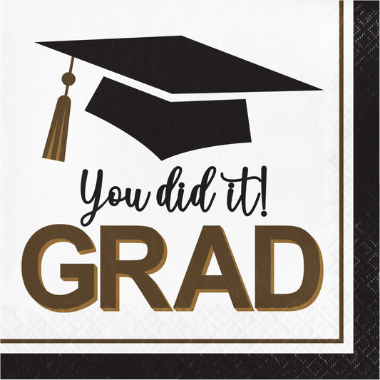 Graduation-themed napkin with 'You did it! GRAD' text and a black graduation cap.