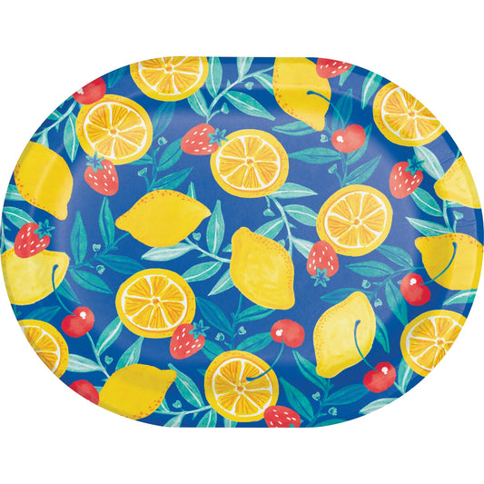 Colorful oval plate with lemon and strawberry pattern on a blue background