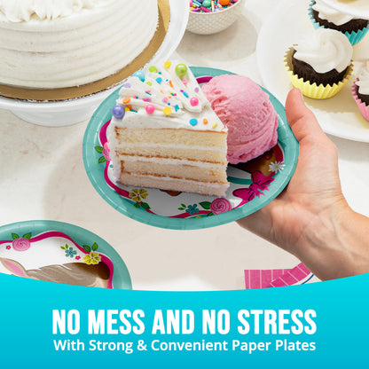 Hand holding a slice of cake on a colorful paper plate with ice cream, surrounded by more cakes and plates. Text stating "No Mess and No Stress".