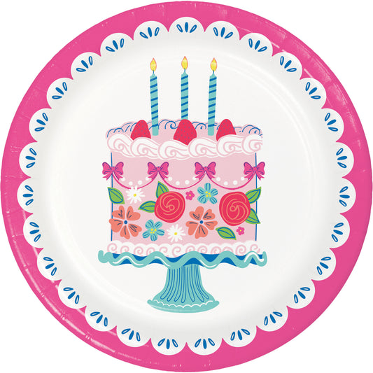 Decorative paper plate with a birthday cake design featuring candles, flowers, and a pink border.