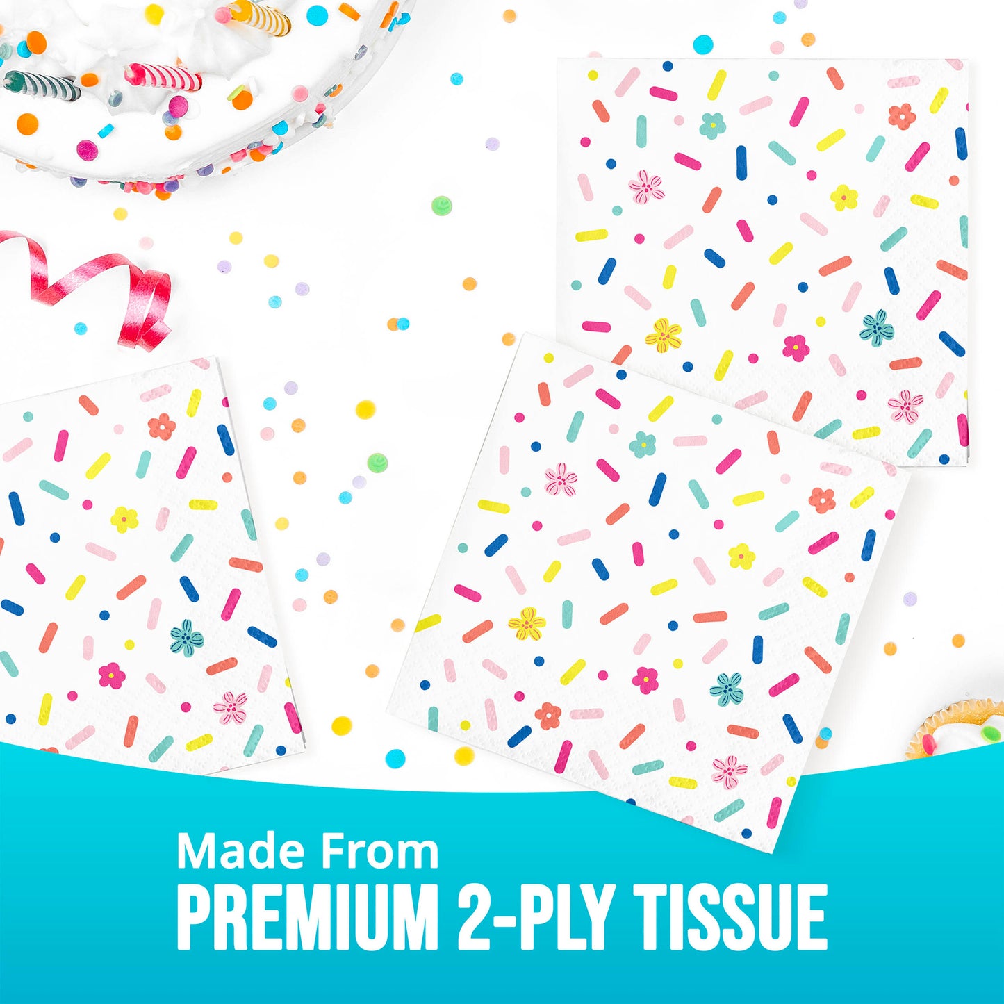 Colorful tissue paper napkin with sprinkles and flowers on a white background, labeled 'Made From Premium 2-Ply Tissue'.