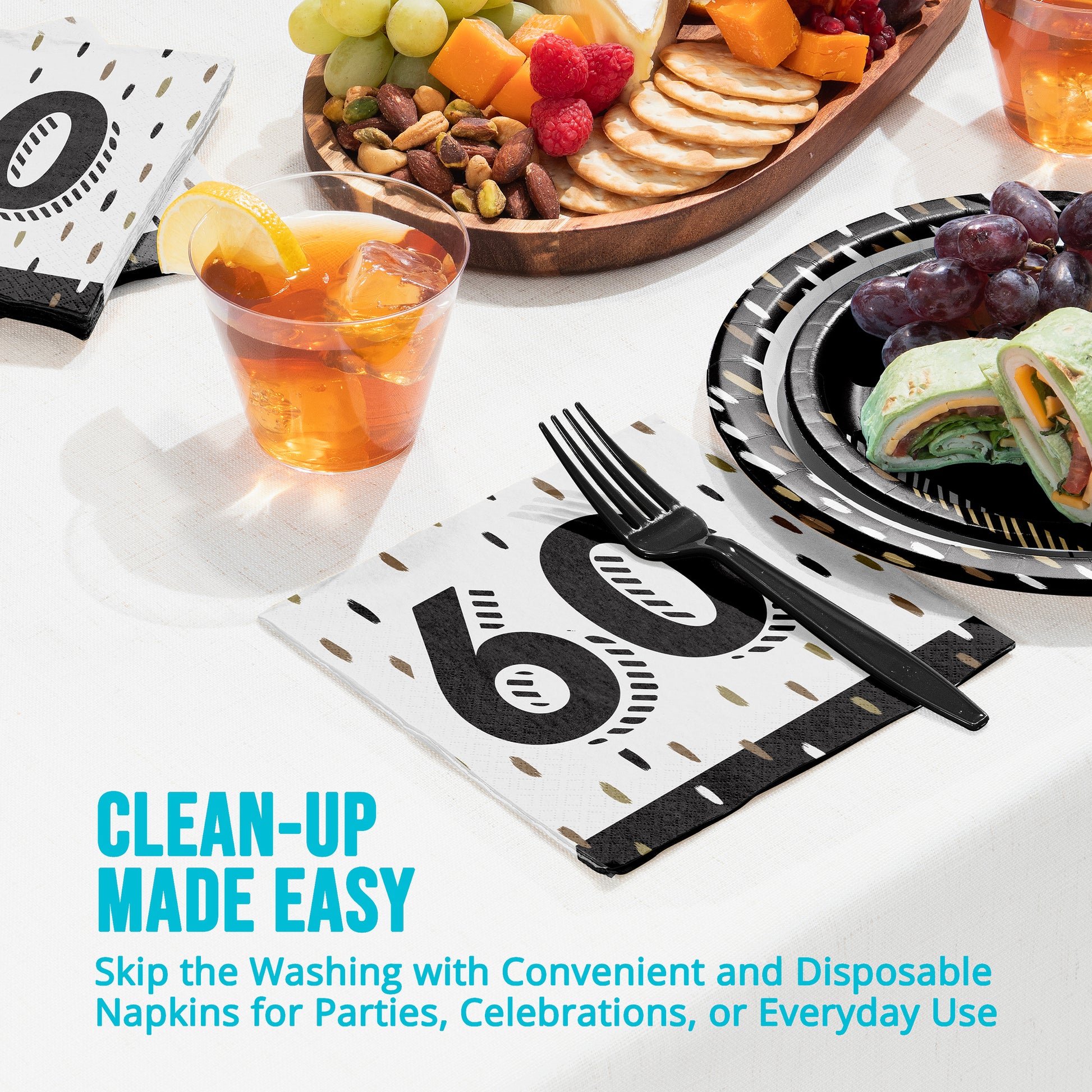 Disposable napkins with cutlery on a table with food and drinks, featuring text 'Clean-up Made Easy'.