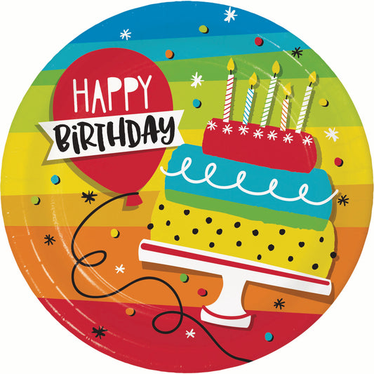 Colorful birthday plates with a cake and balloons on a rainbow background