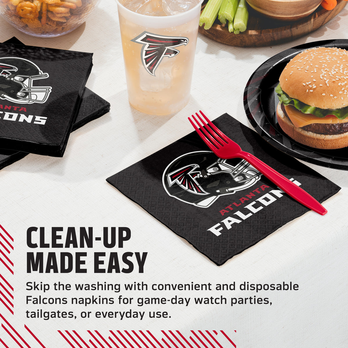 Black Atlanta Falcons branded paper napkins on a white table, shown with a matching plastic cup, red fork, burger, and fries. Text on the image reads 'CLEAN-UP MADE EASY' and describes disposable Falcons napkins for game-day watch parties, tailgates, or everyday use.