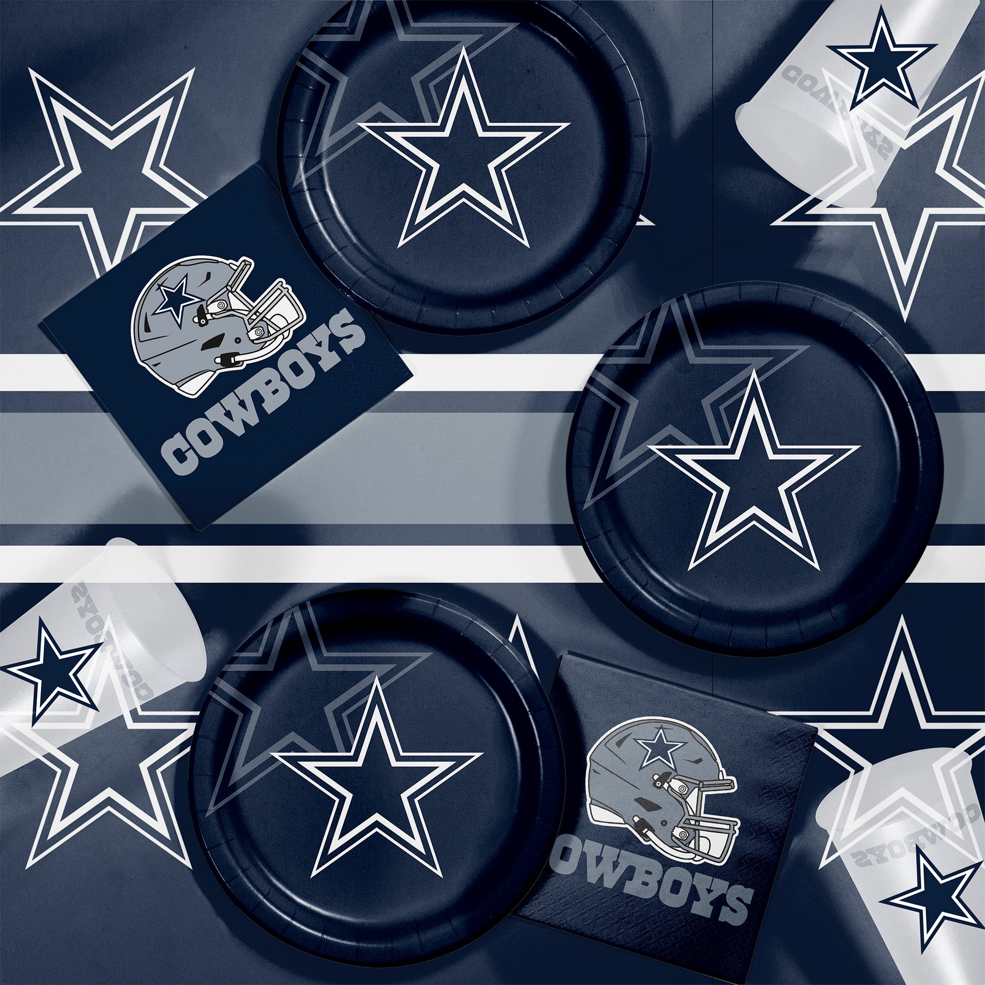Dallas Cowboys-themed paper plates and napkins with star designs on a matching background.