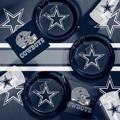 Dallas Cowboys-themed paper plates and napkins with star designs on a matching background.