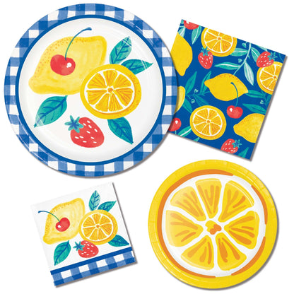 Fruit-themed paper plates and napkins with lemons, strawberries, and cherries on a white background.