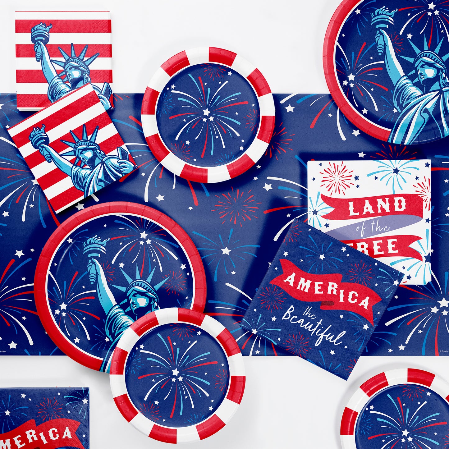 Red, white, and blue party supplies with Statue of Liberty and fireworks design.