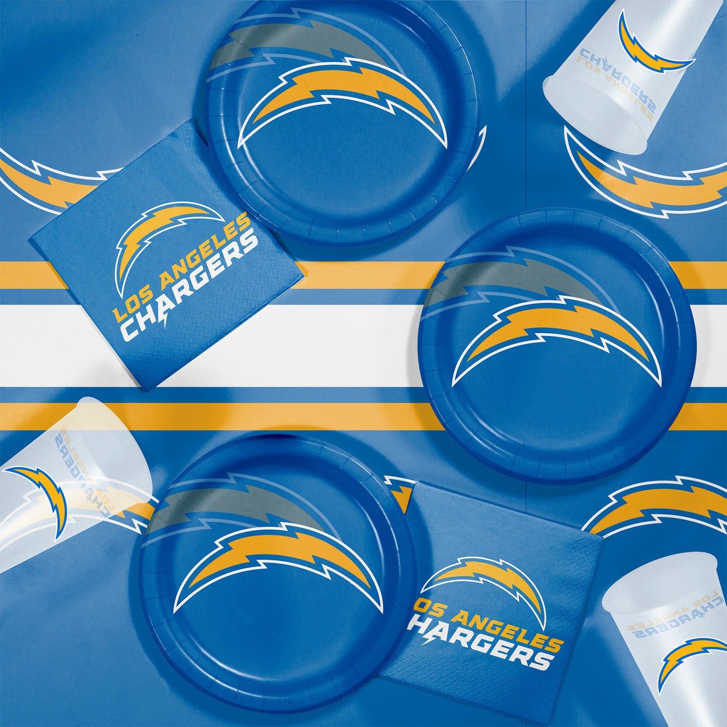 Los Angeles Chargers plates, napkins and cups displayed on a matching tablecloth