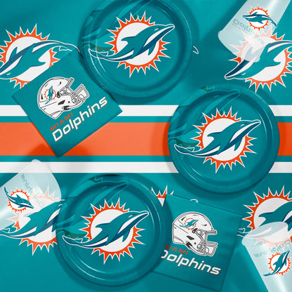 Miami Dolphins plates, napkins and cups displayed on a matching tablecloth