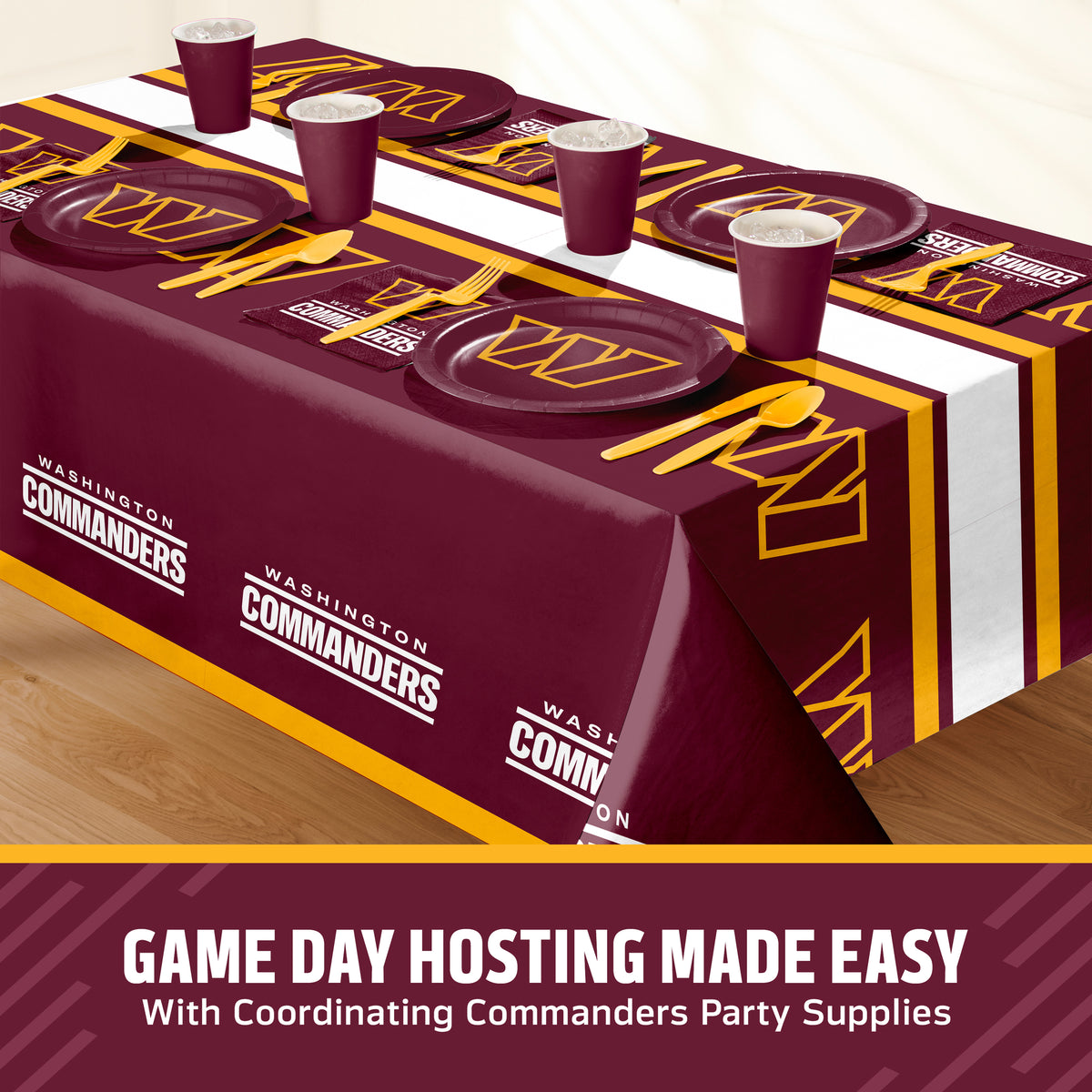 Washington Commanders themed party table setting with a printed tablecloth, matching plates, cups, and utensils, shown on a table with a promotional banner at the bottom that says "Game Day Hosting Made Easy".