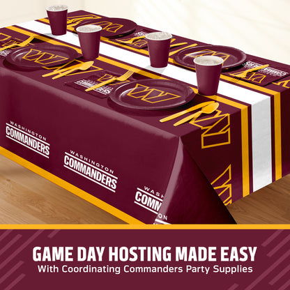 Washington Commanders themed party table setting with a printed tablecloth, matching plates, cups, and utensils, shown on a table with a promotional banner at the bottom that says "Game Day Hosting Made Easy".