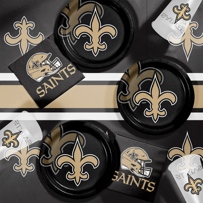 New Orleans Saints plates, napkins and cups displayed on a matching tablecloth